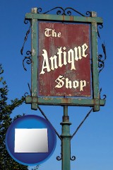 colorado map icon and an antique shop sign