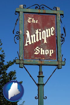 an antique shop sign - with Maine icon