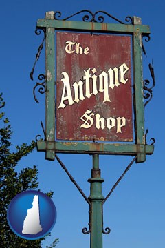 an antique shop sign - with New Hampshire icon