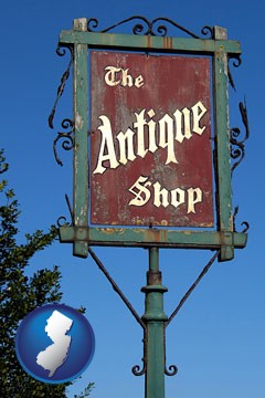 an antique shop sign - with New Jersey icon