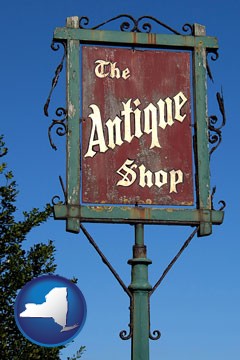 an antique shop sign - with New York icon