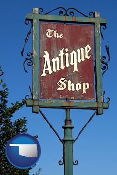 an antique shop sign - with Oklahoma icon