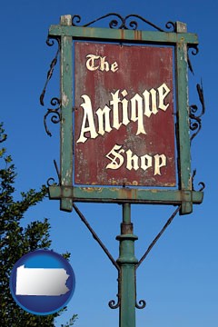 an antique shop sign - with Pennsylvania icon