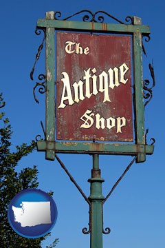 an antique shop sign - with Washington icon