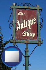 wyoming map icon and an antique shop sign