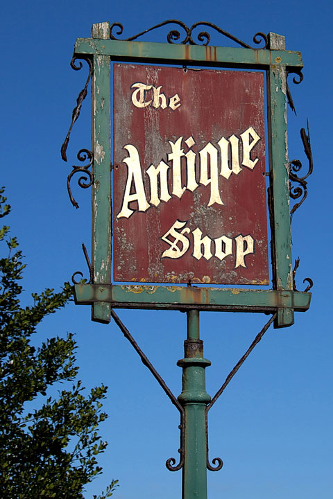 an antique shop sign